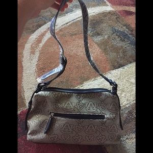 Auburn tiger Sandol purse. Condition is New.
